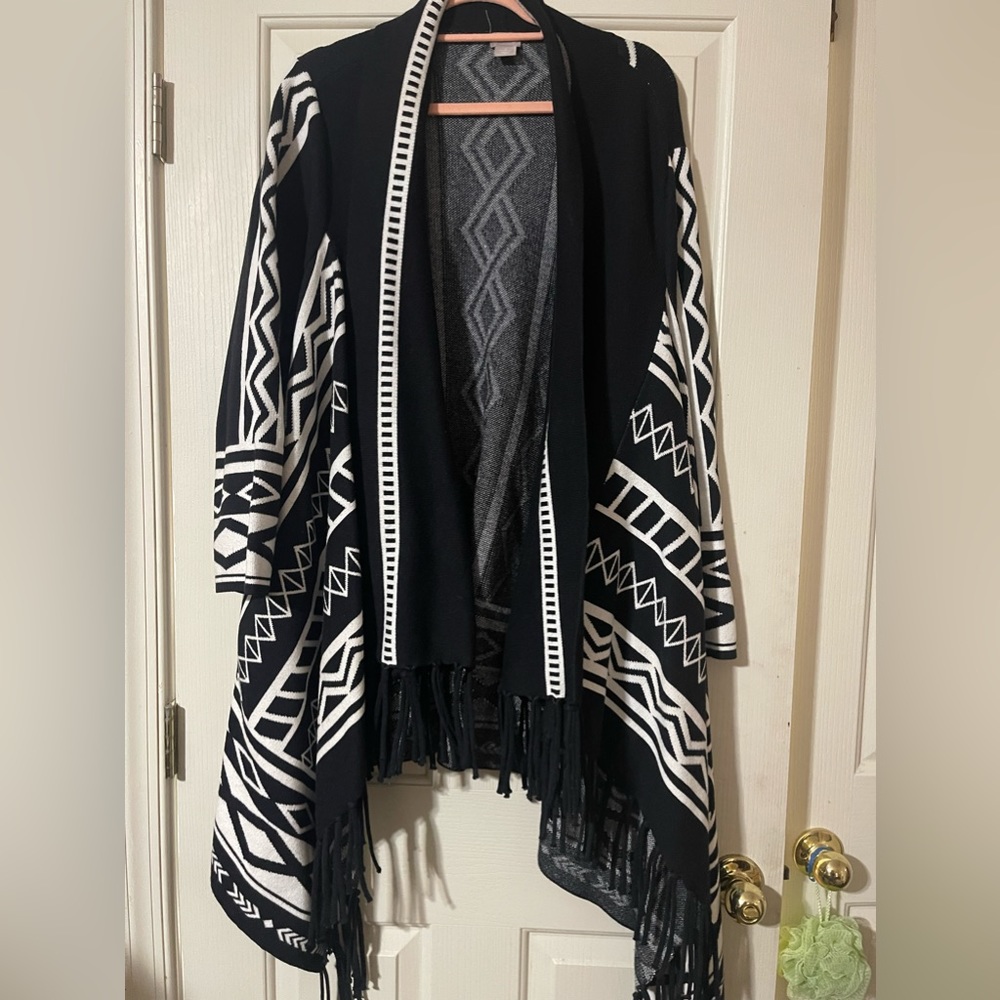 Cute size 3 black fringed sweater with bold and striking design